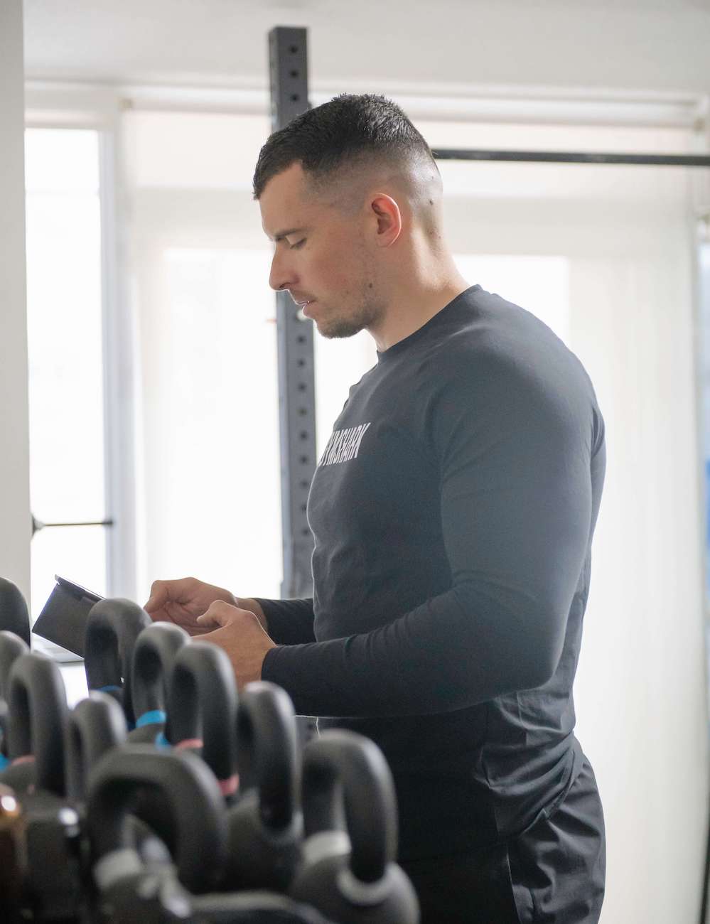 Romain lifting dumbells.